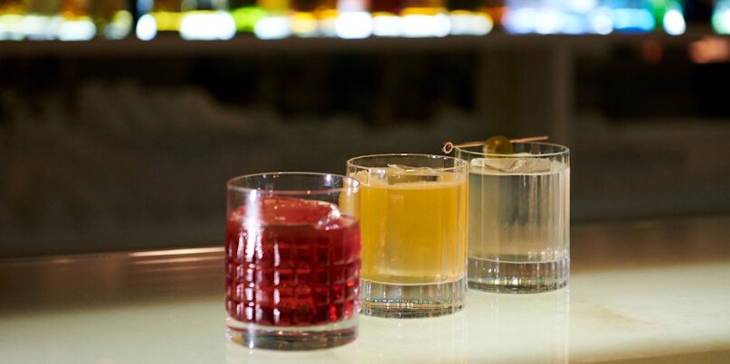 three different drink at the bar