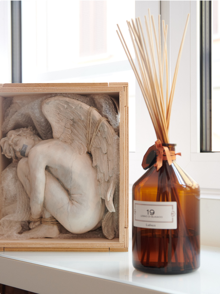 sculpture of the caged angel and essence #19